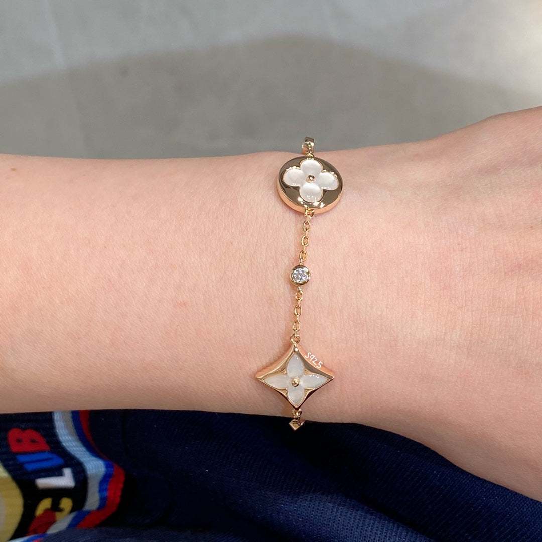 [✨ROSE💎]STAR AND SUN 4 MOTIF WHITE MOP PINK GOLD BRACELET