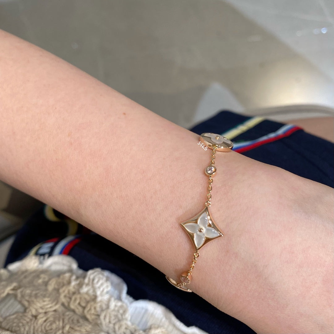 [✨ROSE💎]STAR AND SUN 4 MOTIF WHITE MOP PINK GOLD BRACELET